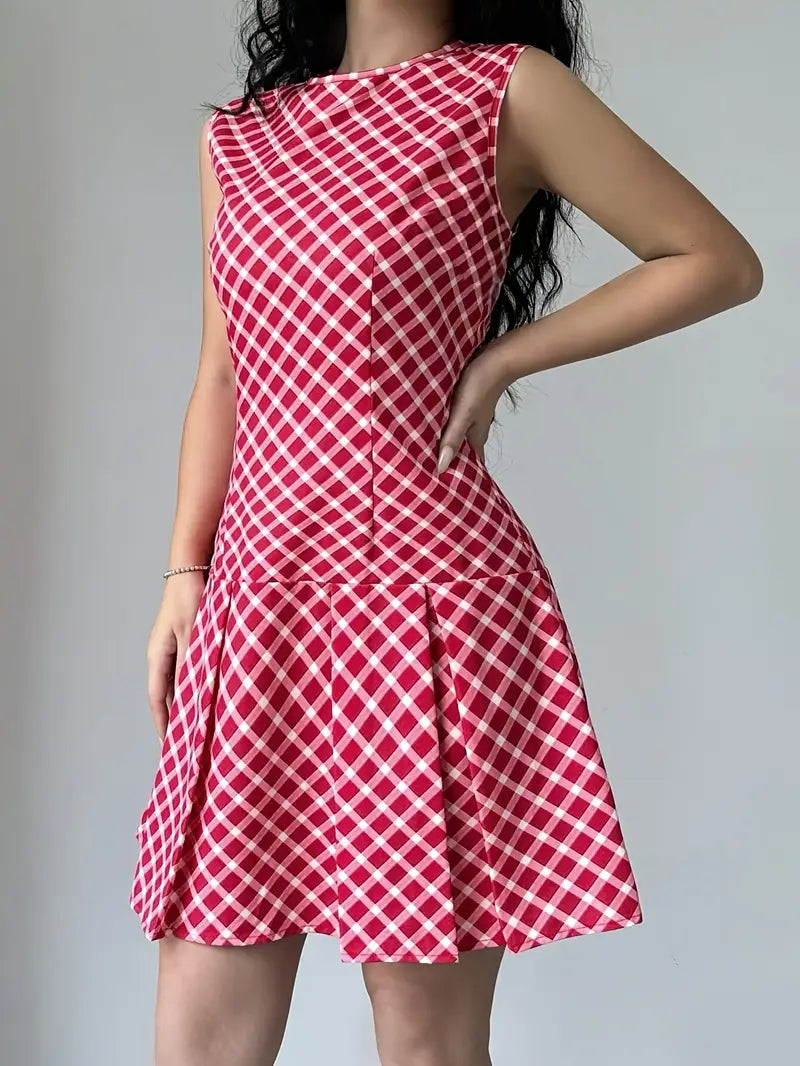 Mode Outlet | Stylowa sukienka bez rękawów z plisami – ponadczasowa elegancja