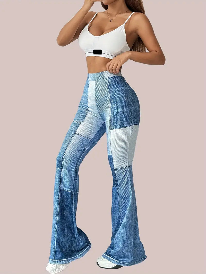 Mode Outlet | Elyssara Spodnie Dzwony z Haftem – Modne i Unikalne