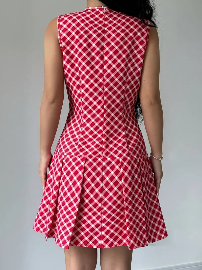 Mode Outlet | Stylowa sukienka bez rękawów z plisami – ponadczasowa elegancja